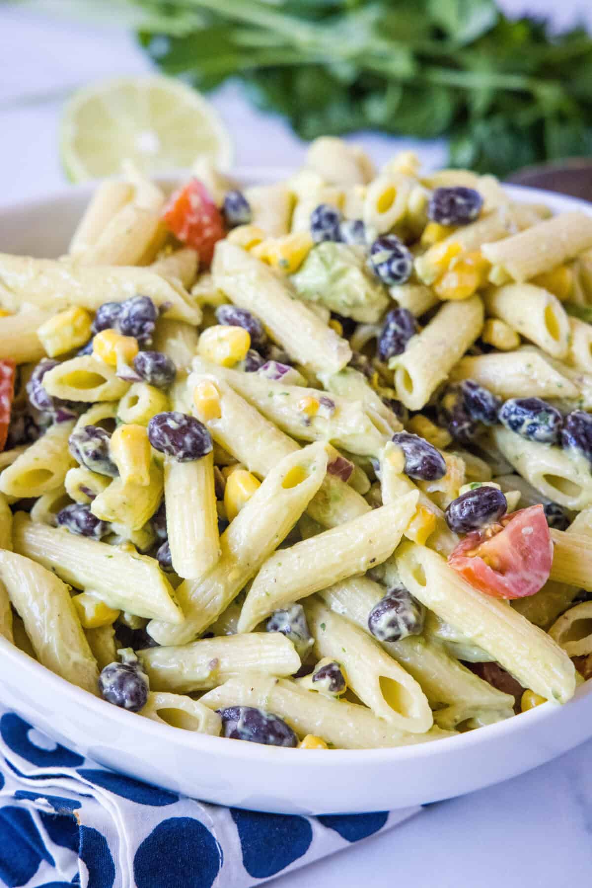 Creamy Avocado Pasta Salad | Dinners, Dishes, and Desserts avocado pasta salad in serving bowl