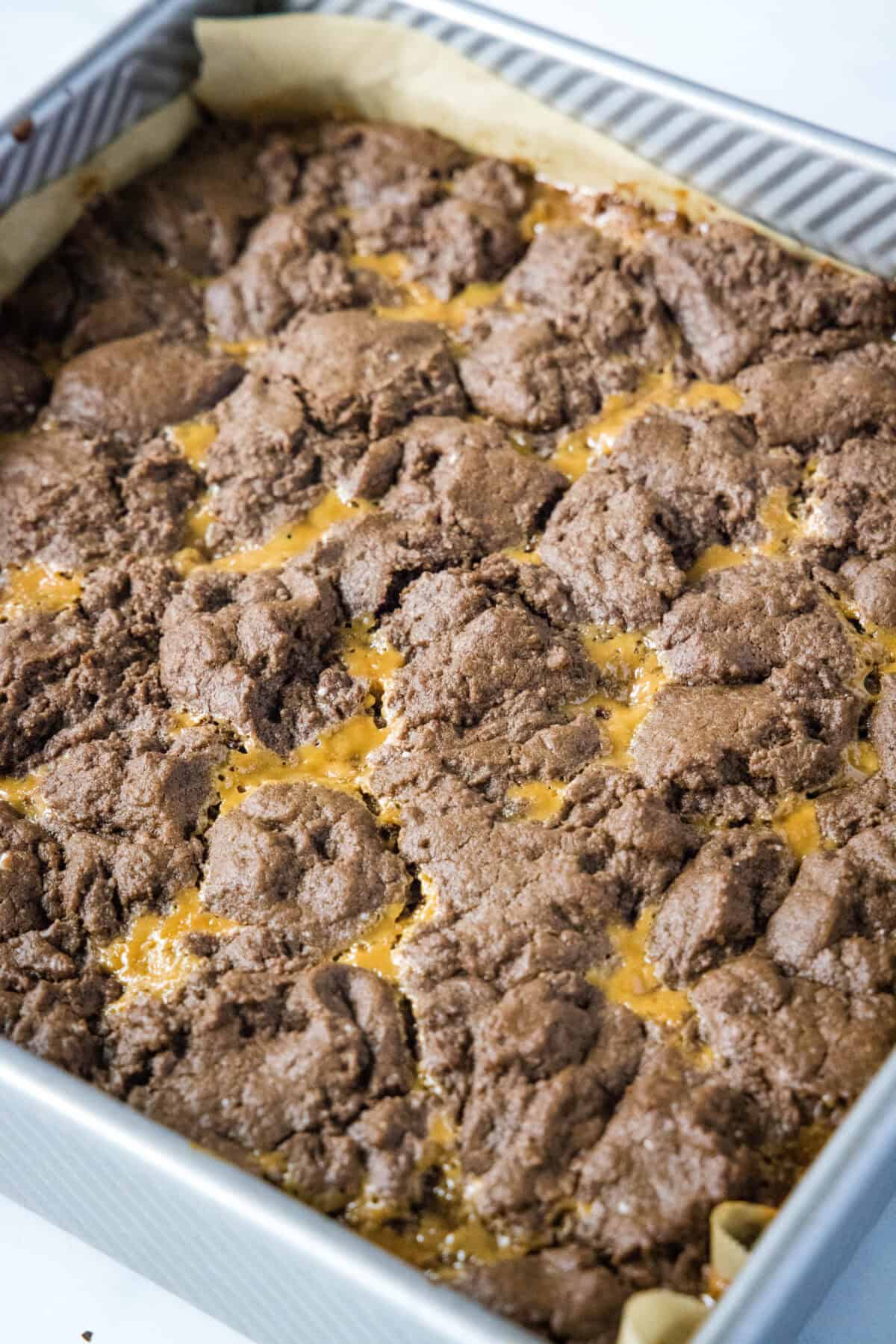 baked caramel layer bars in baking pan