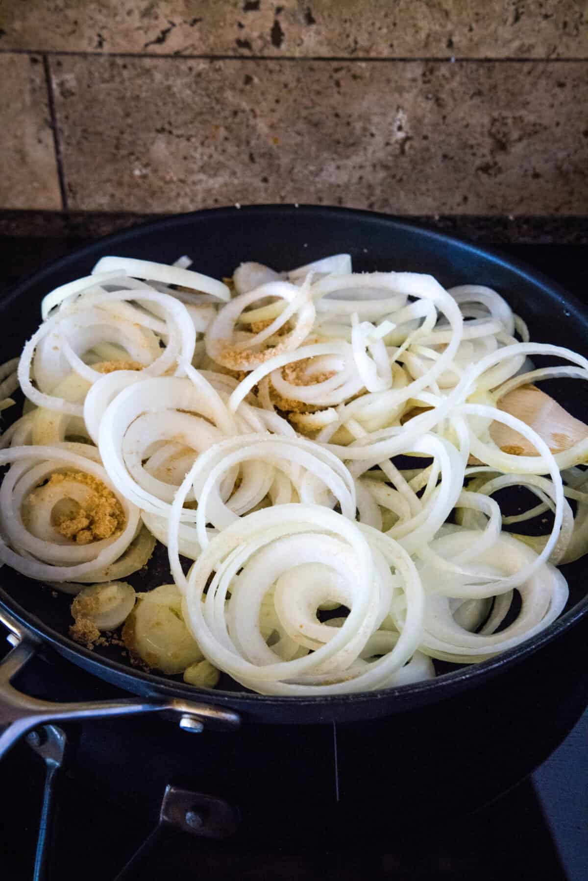 onions with brown sugar in a skillet