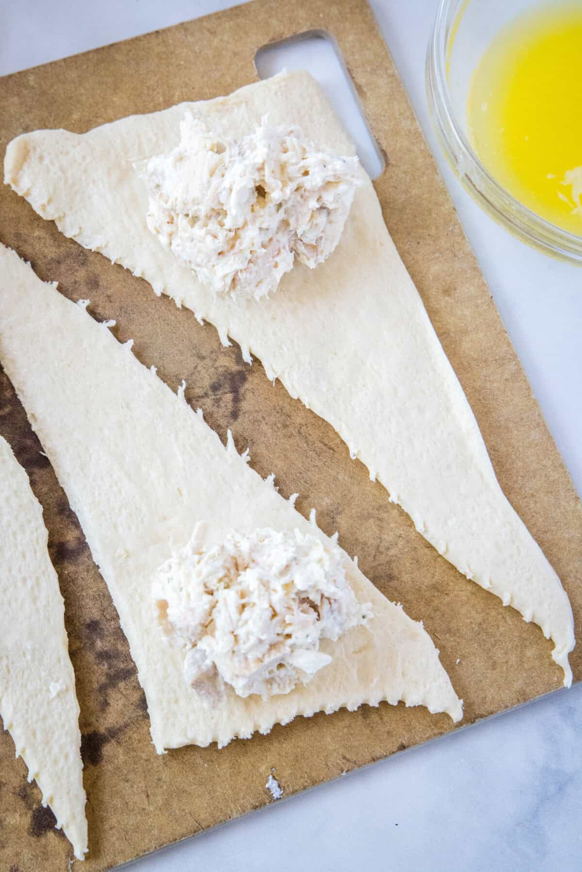 chicken filling on crescent roll triangles