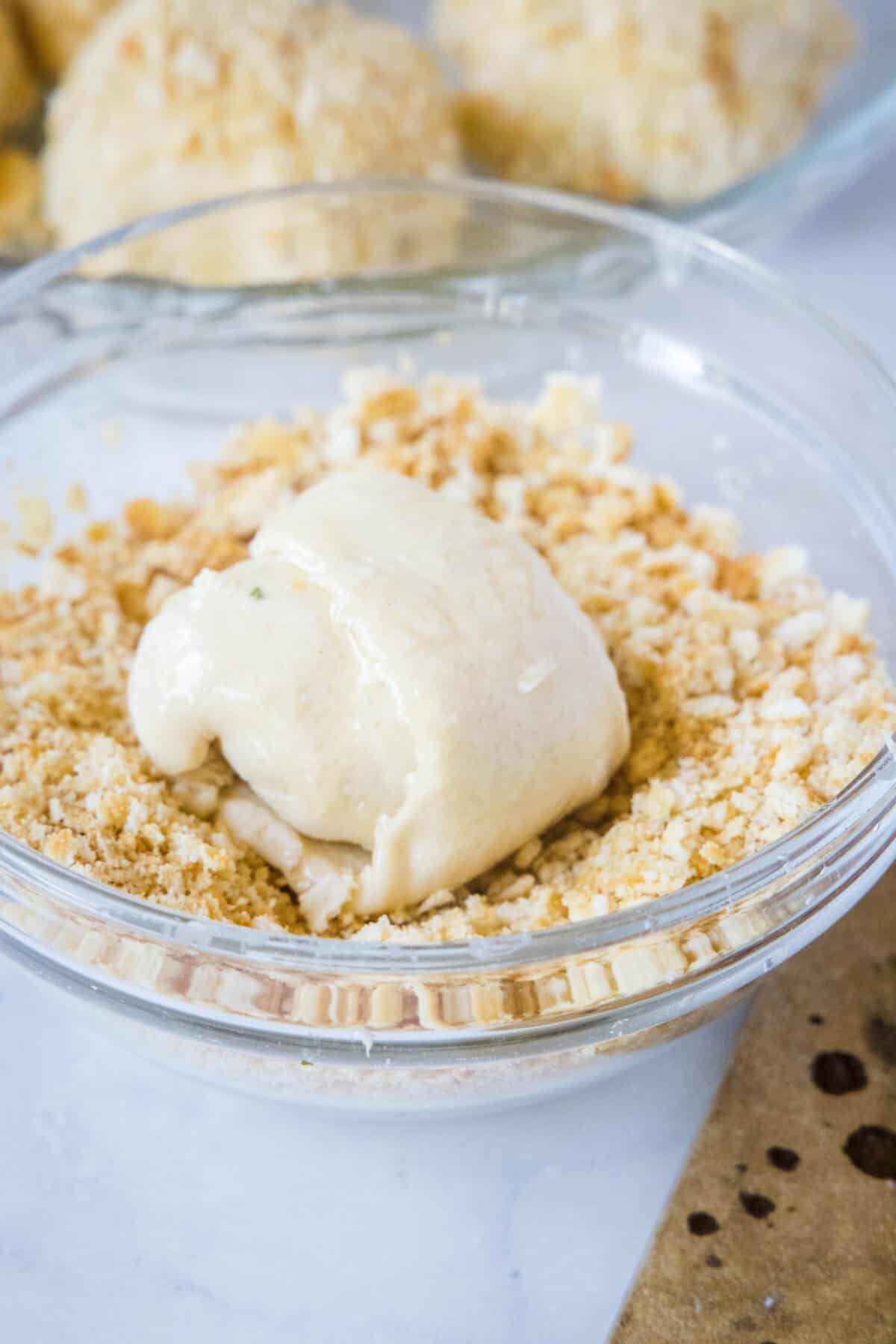 chicken roll ups in cracker crumbs for coating