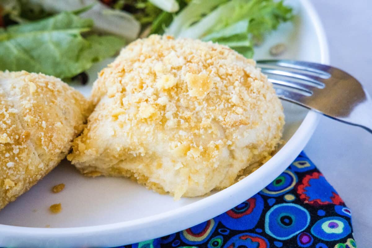 Chicken roll ups are made with creamy ranch-seasoned chicken wrapped in crescent roll dough and coated in crushed Ritz crackers. A quick, crowd-pleasing dinner or appetizer ready in under 30 minutes.