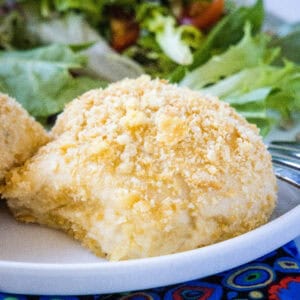 close up chicken roll ups on plate