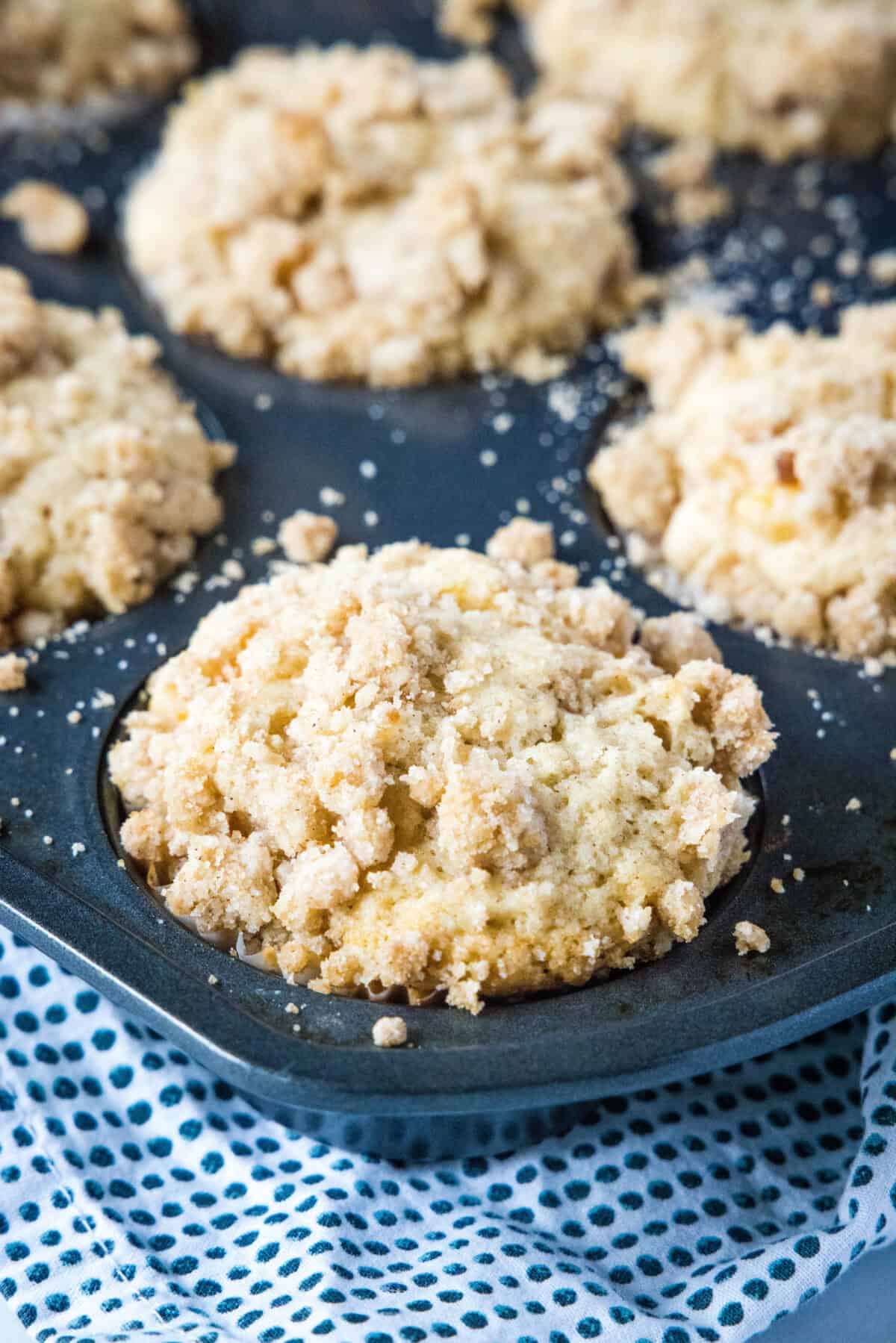 Peach Cobbler Muffins peach cobbler muffins in baking tray