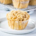 cropped close up peach muffin on a plate