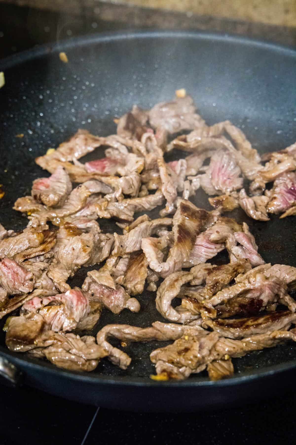 browned steak in a pan