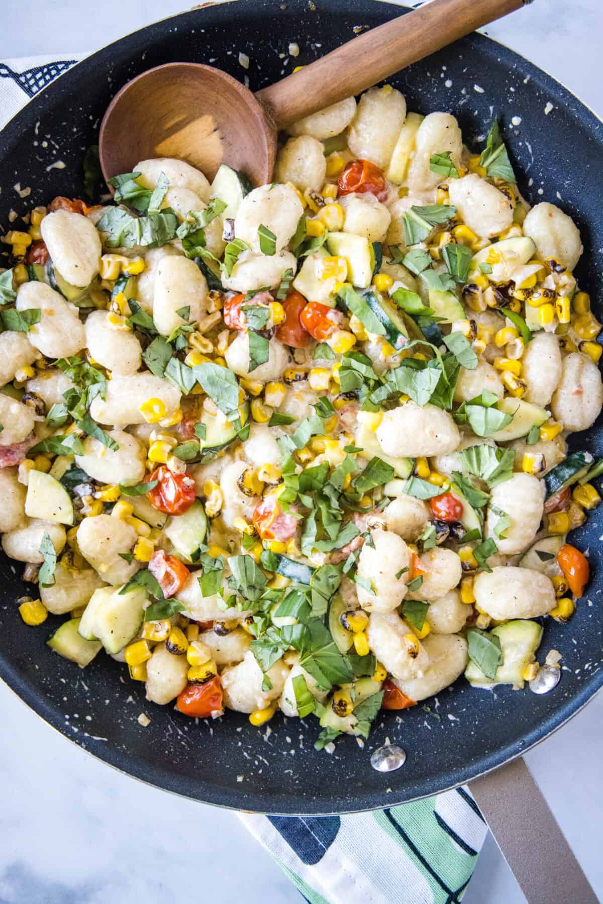 looking down on skillet with summer gnocchi
