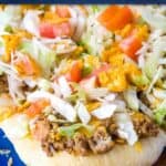 taco pizza with text overlay for pinterest
