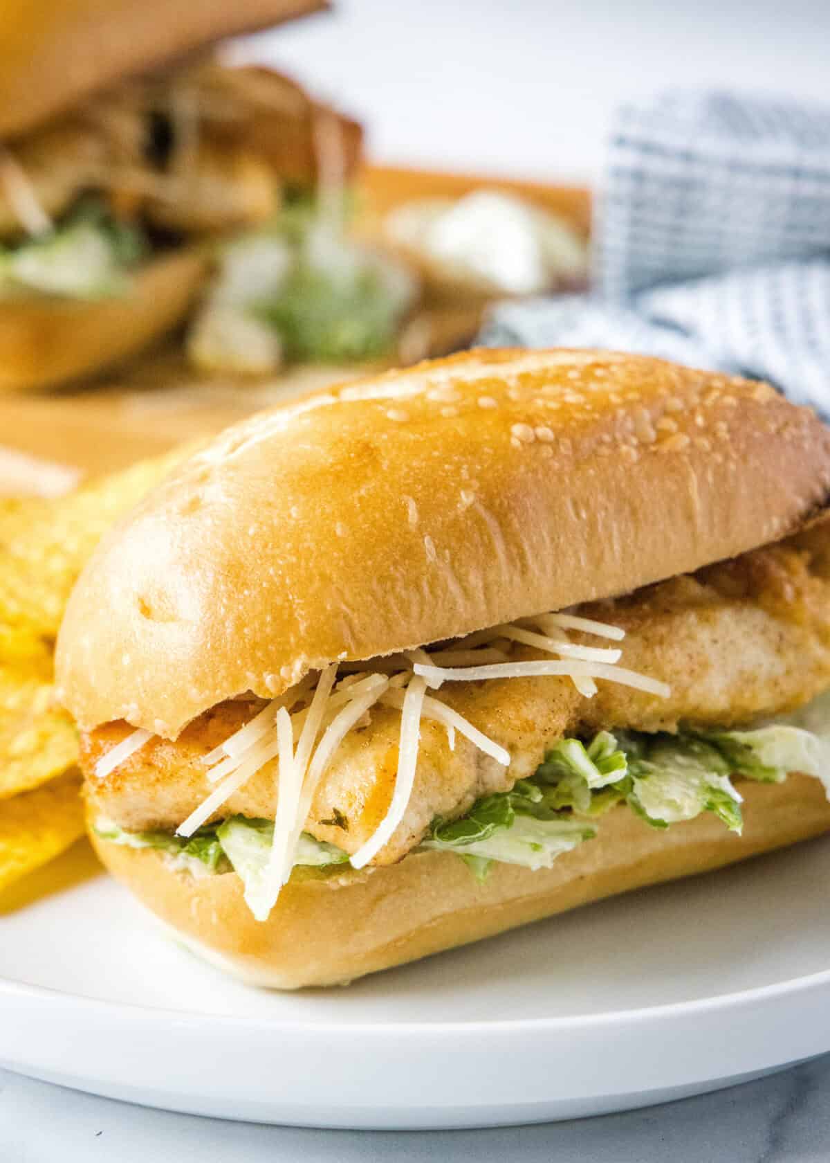 chicken caesar sandwich on a plate