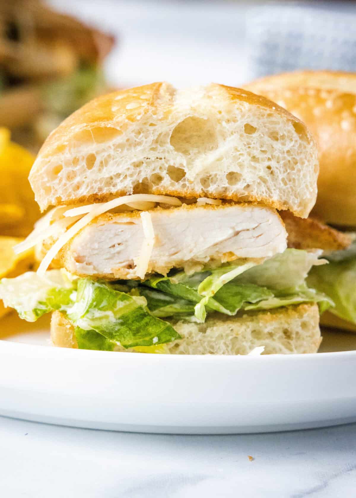 chicken caesar sandwich cut in half
