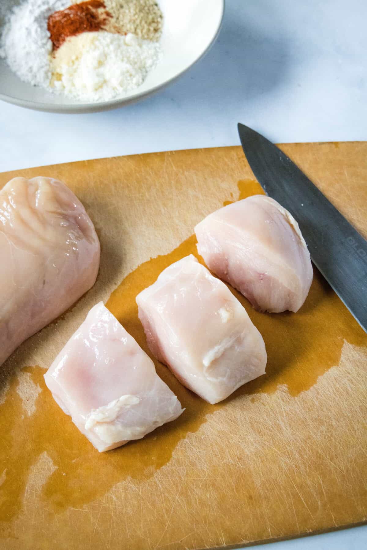 cut chicken to make cutlets