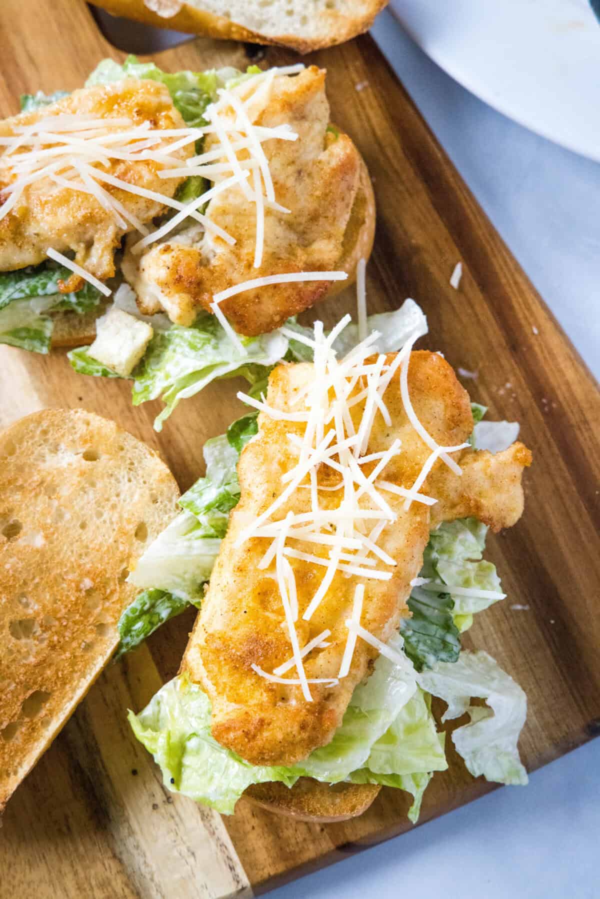 assembling chicken caesar sandwich