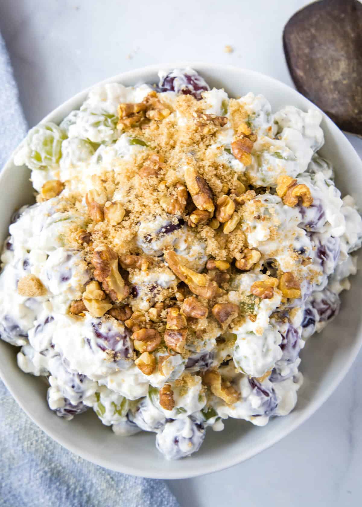 grape salad in white serving bowl