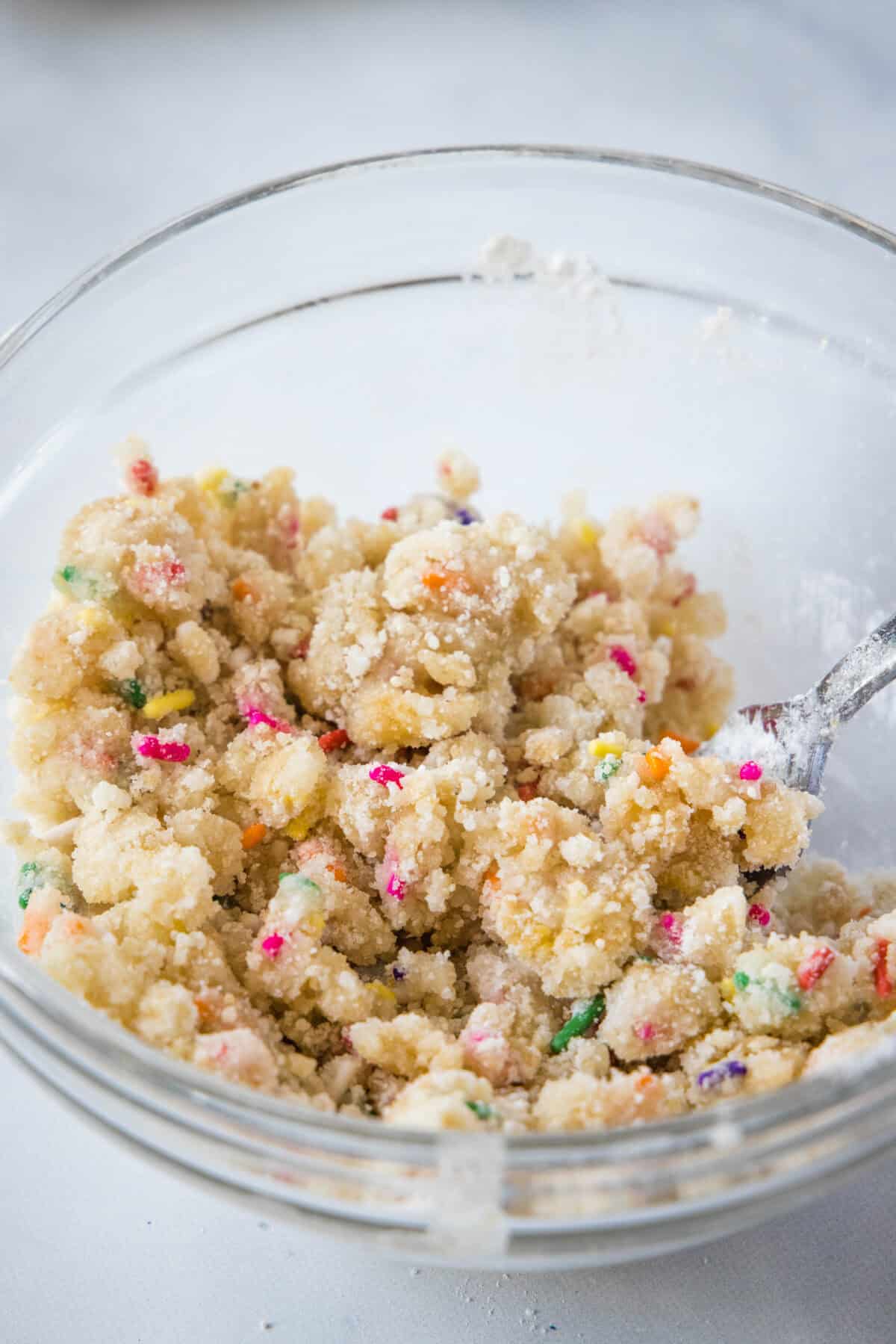 birthday cake crumbs in mixing bowl