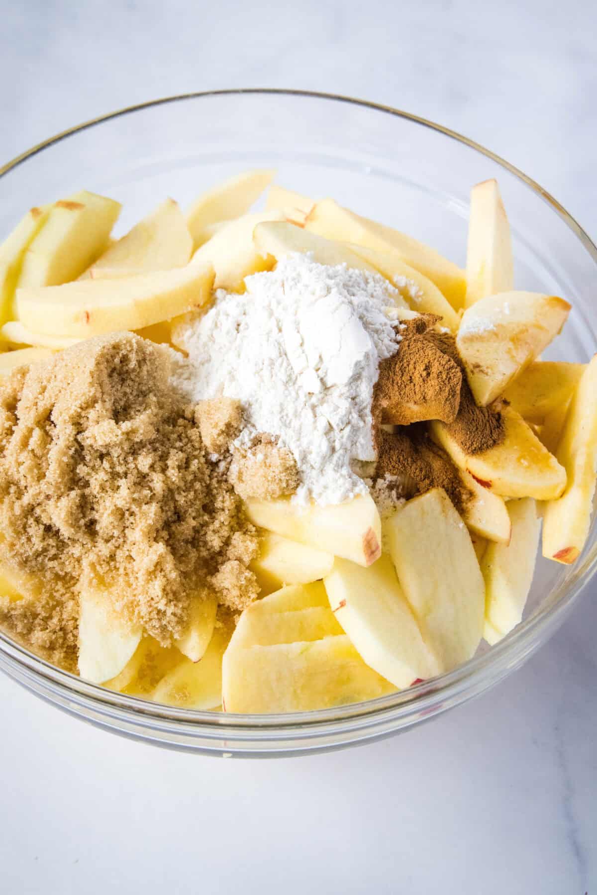 apple crisp base ingredients in a mixing bowl