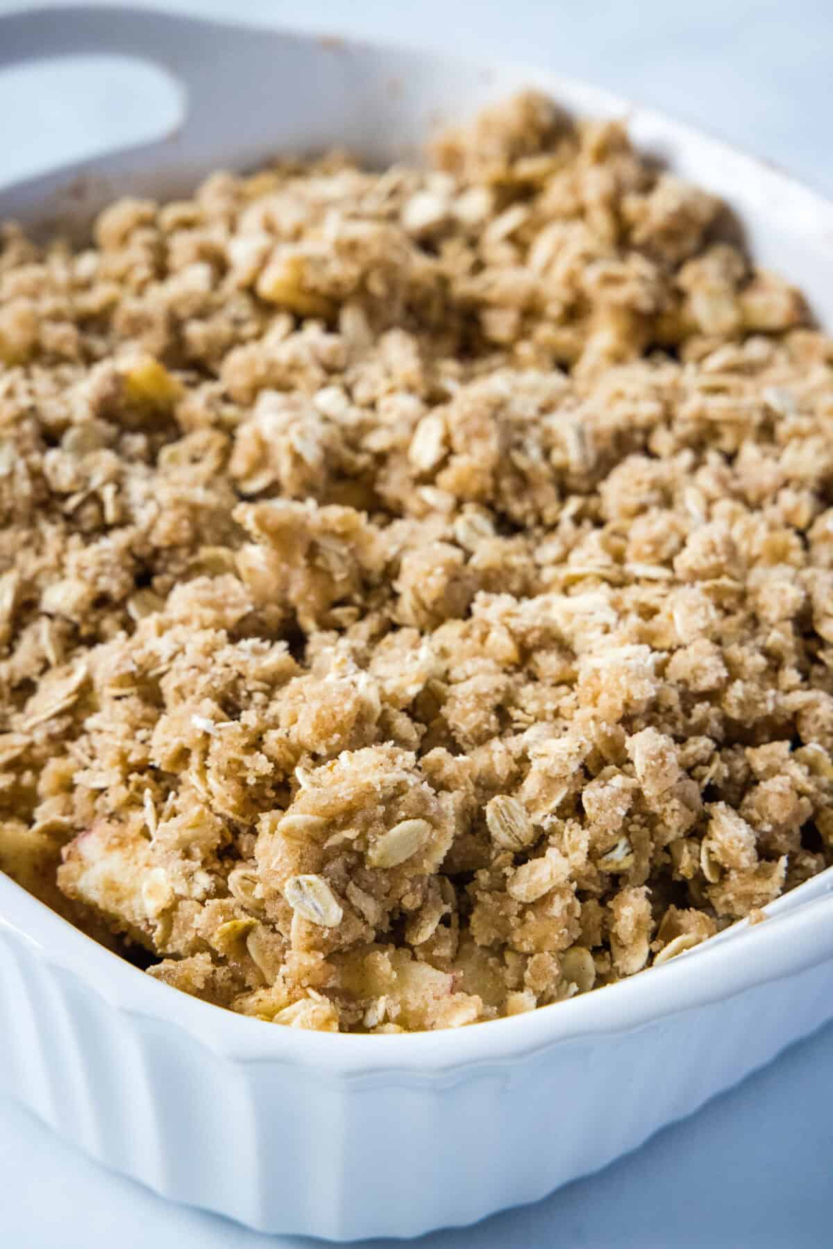 topping on apple crisp ready for the oven