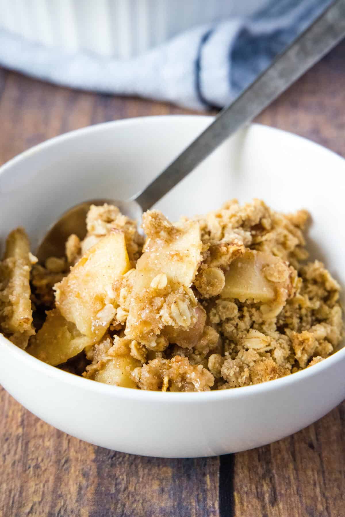 serving of apple crisp in a bowl