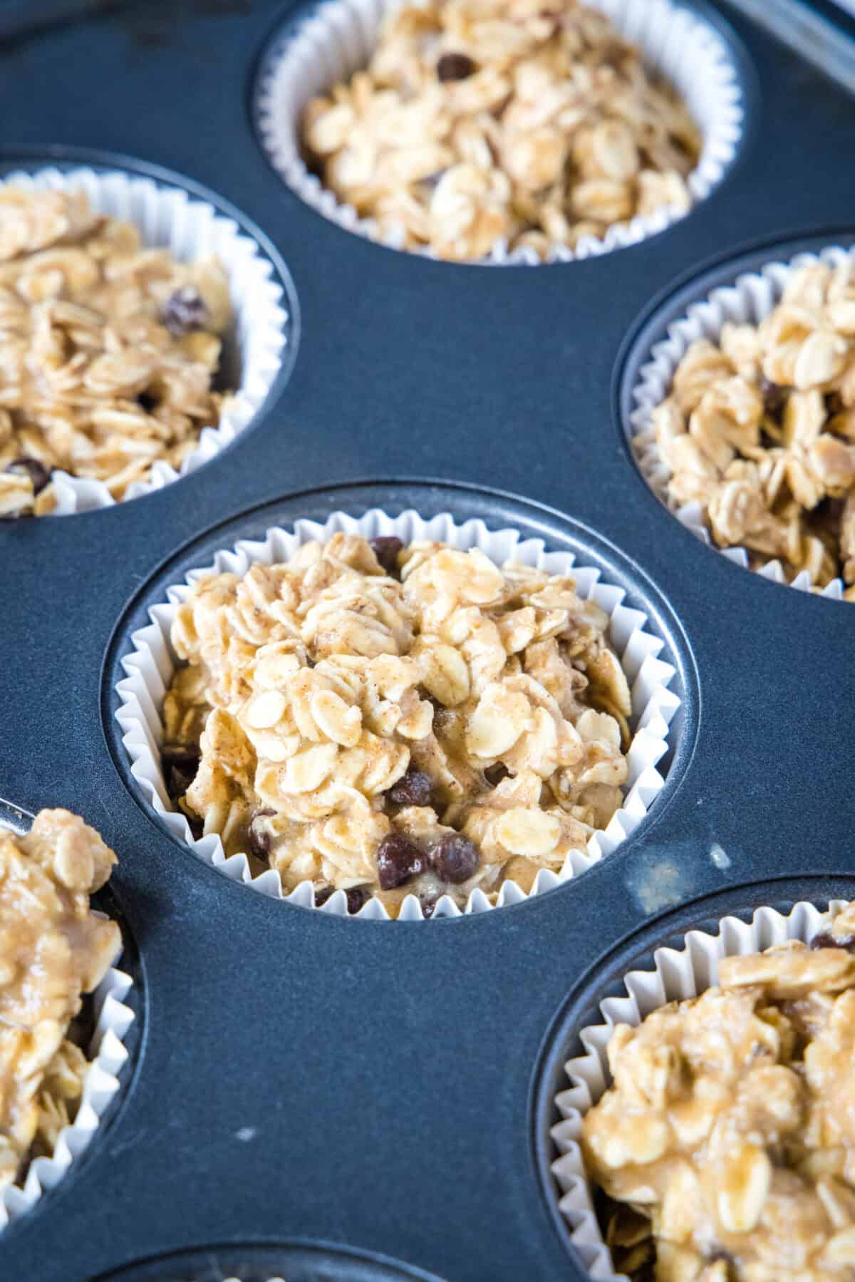 baked oatmeal cups batter in muffin tin
