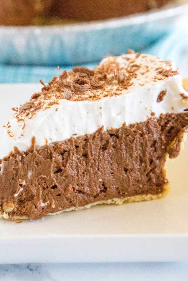close up slice of french silk pie on a plate