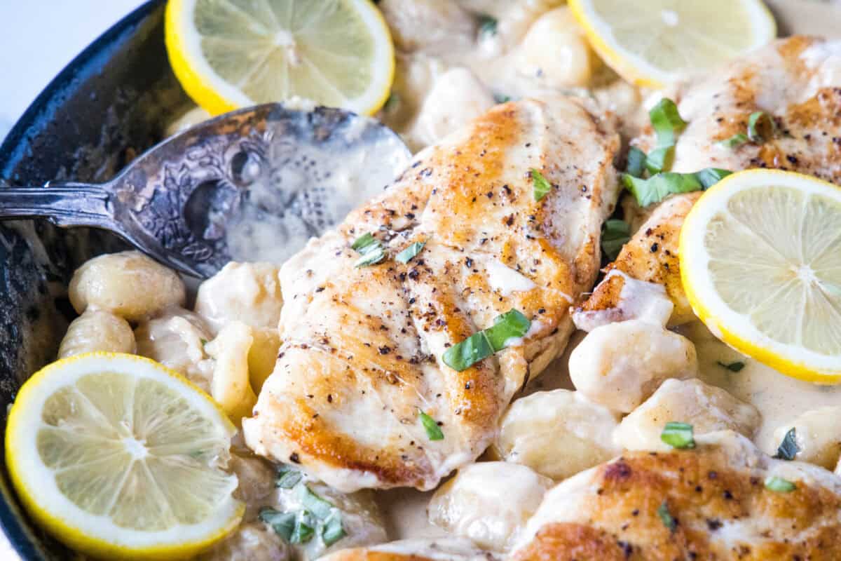 Lemon Chicken Gnocchi is a one-pan dinner with seared chicken and pillowy gnocchi in a creamy lemon Parmesan sauce, ready in about 30 minutes.