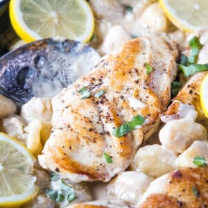 cropped close up lemon chicken gnocchi in pan