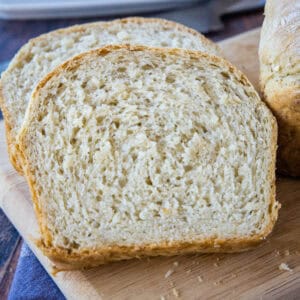 cropped close up slice oatmeal bread on cutting board