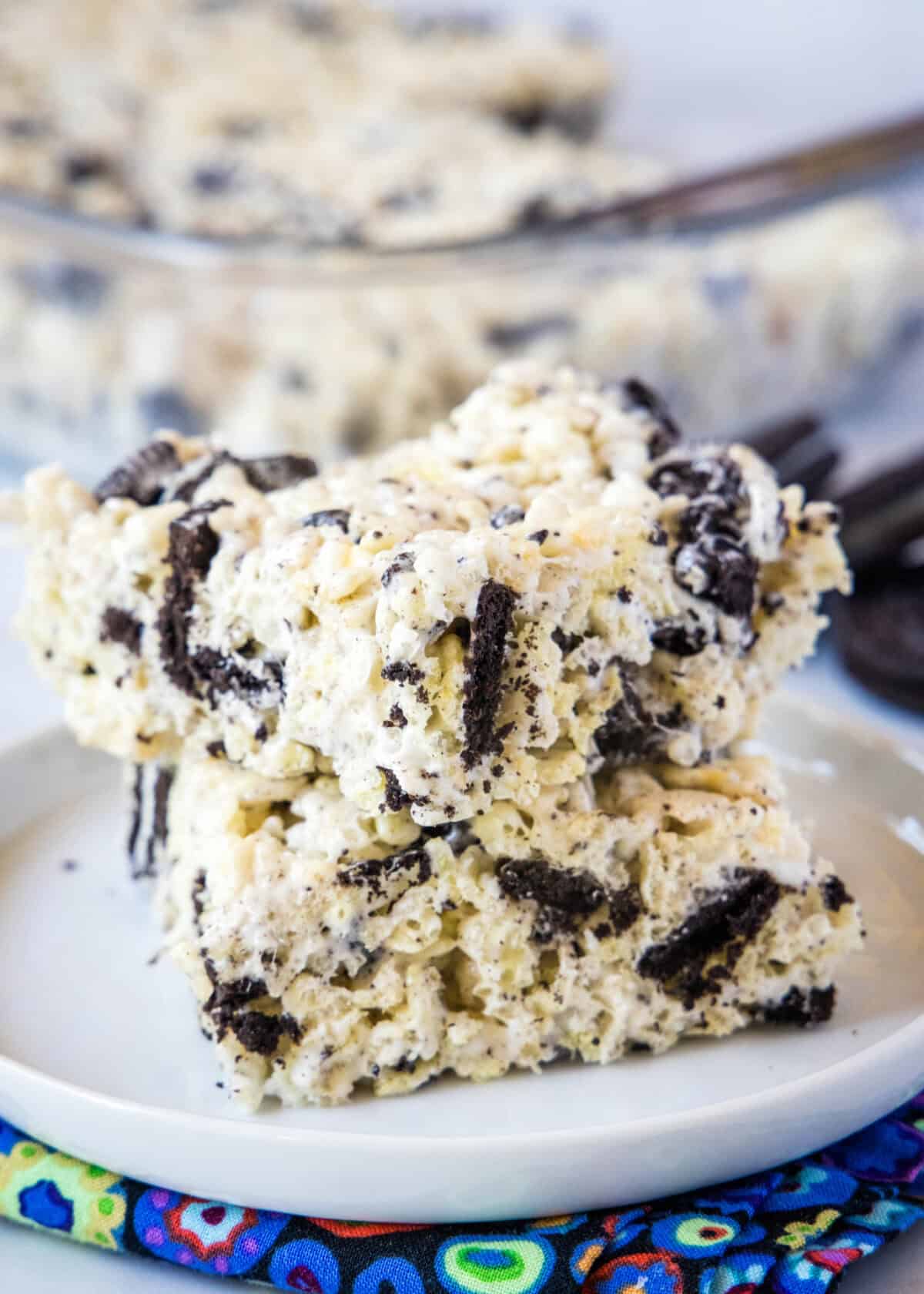 oreo rice krispie treats stacked on a white plate