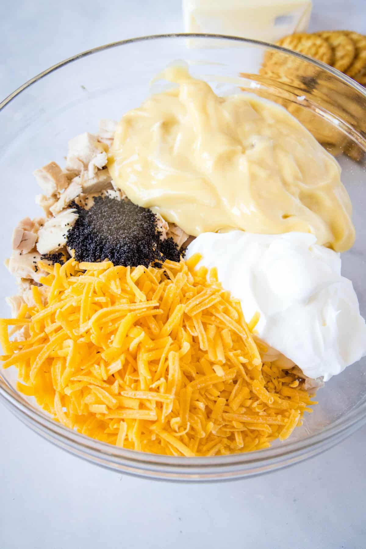 poppy seed chicken filling ingredients in mixing bowl