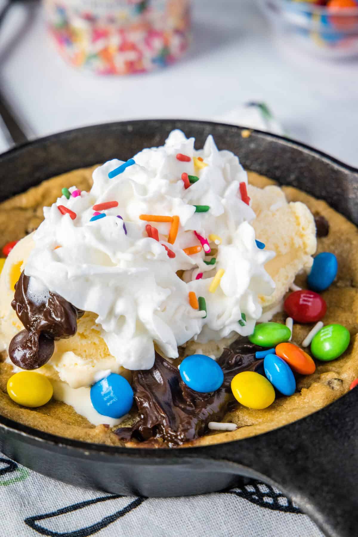 skillet cookie with whipped cream and toppings