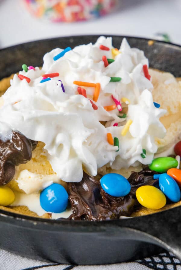 skillet cookie with whipped cream and toppings