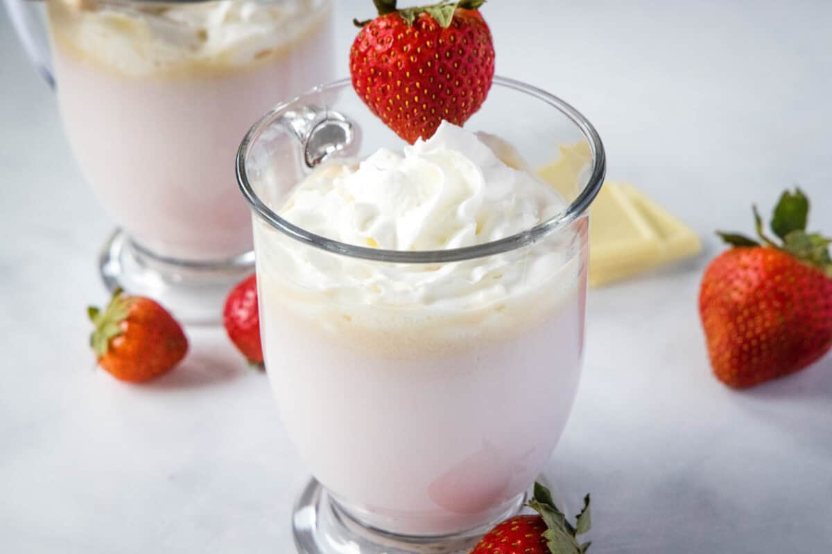 This Strawberry Hot Chocolate is creamy, dreamy, and perfectly pink! Made with fresh strawberries and white chocolate, it's an easy homemade drink that's ready in just 10 minutes. Perfect for cozy nights in or anytime you want a fun twist on classic hot cocoa.