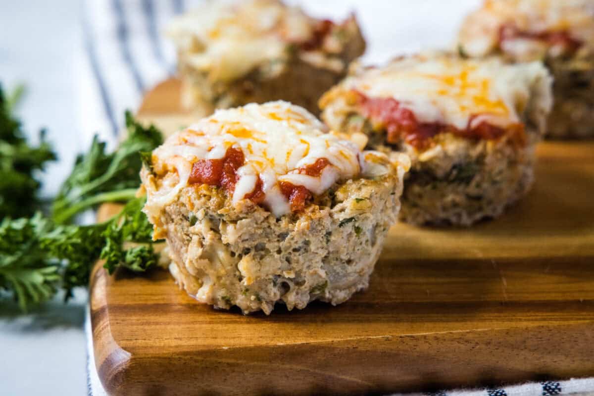 These Turkey Meatloaf Muffins are the easiest weeknight dinner! Juicy ground turkey muffins with oats, marinara, and melted mozzarella, ready in 30 minutes. Perfect for meal prep too!