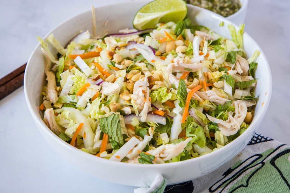 This Vietnamese Chicken Salad is loaded with fresh herbs, crunchy veggies, and shredded chicken, all tossed in a sweet-tangy fish sauce dressing.