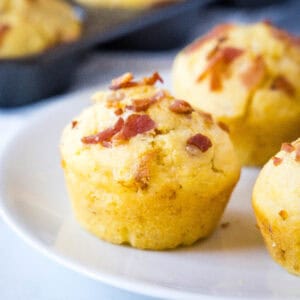 close up bacon corn muffins on a plate