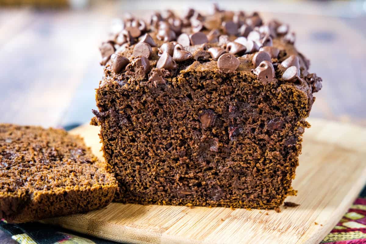 chocolate pumpkin bread sliced on cutting board