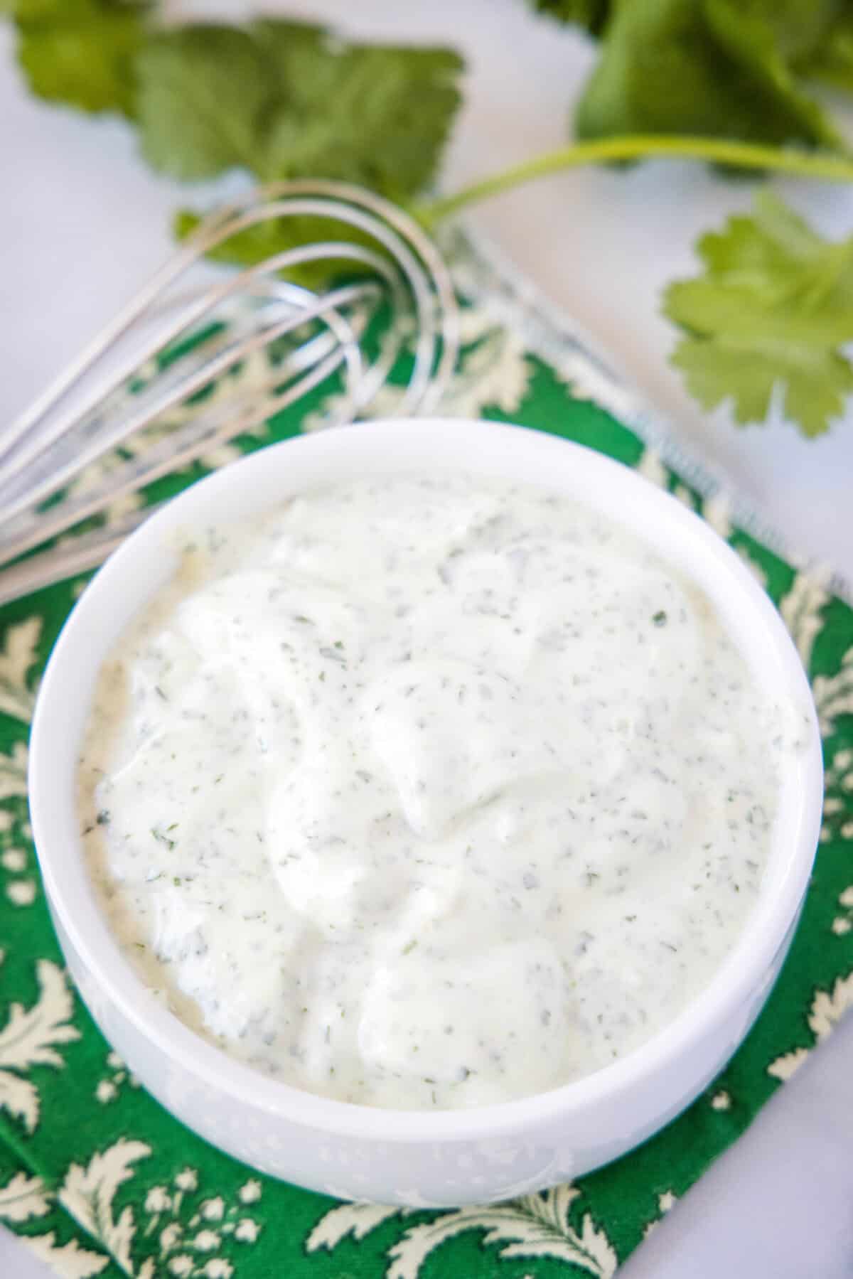 cilantro lime crema in white bowl