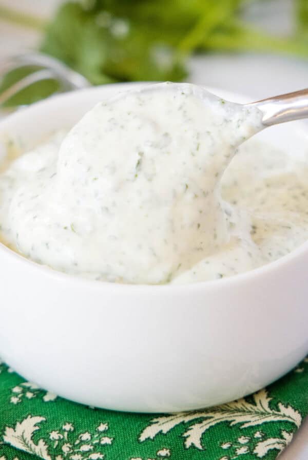 close up cilantro lime crema in a bowl