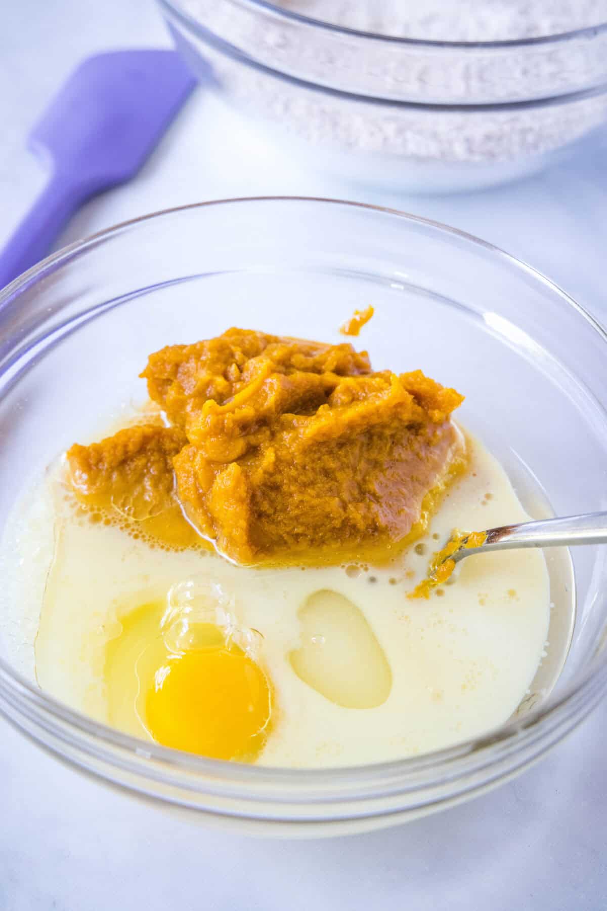pumpkin coffee cake wet ingredients in mixing bowl