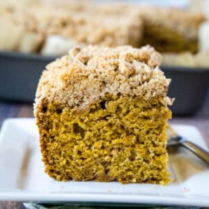 pumpkin coffee cake sliced on a plate