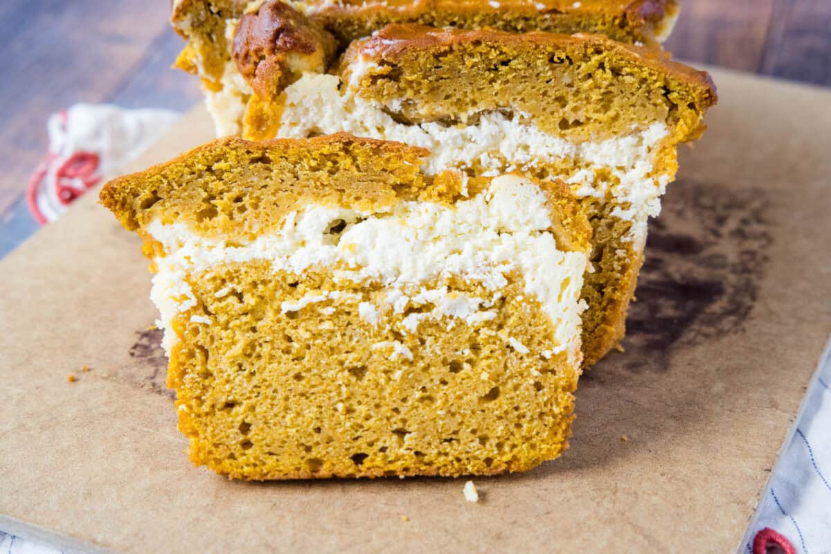 pumpkin cream cheese bread on cutting board