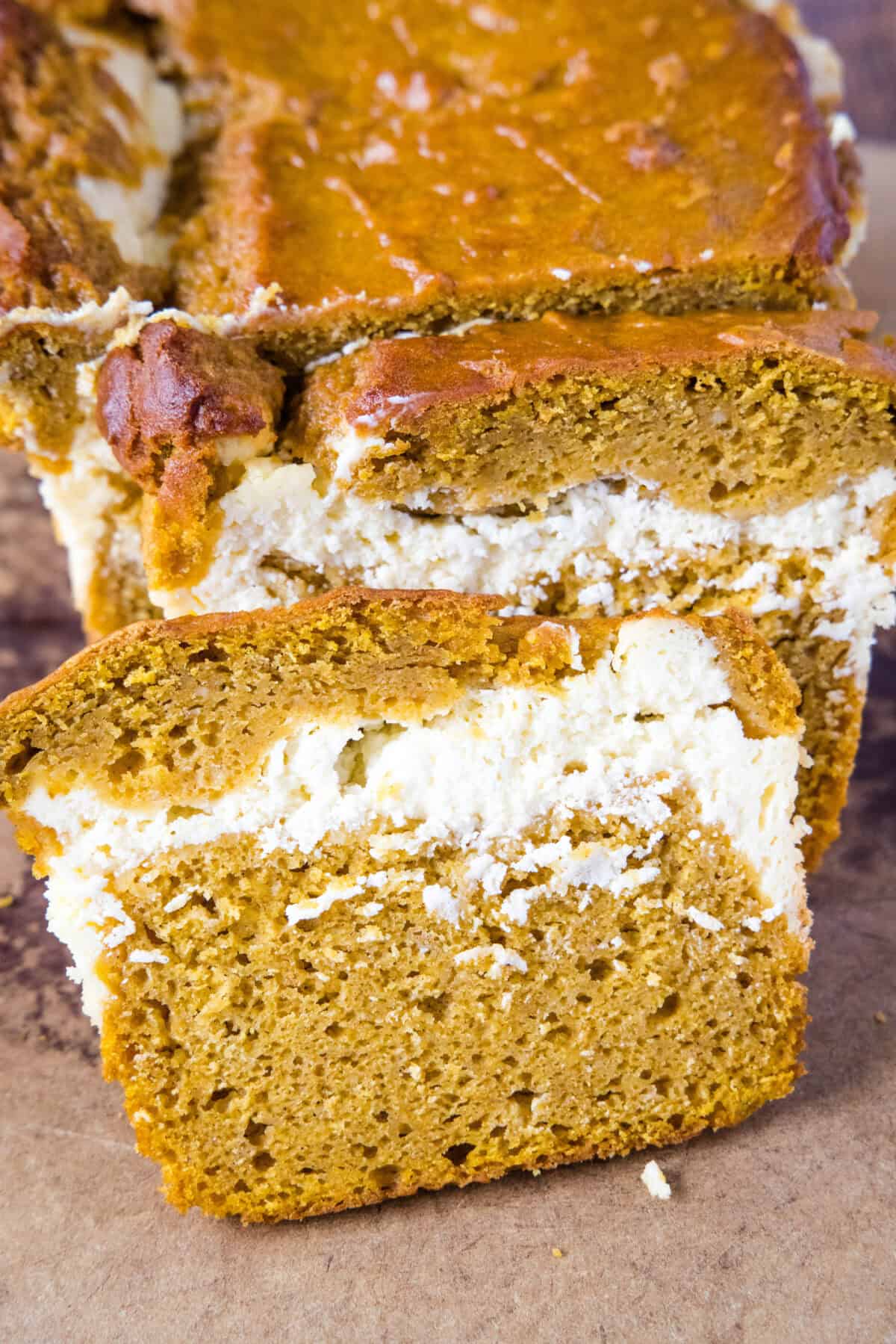 pumpkin cream cheese bread on cutting board