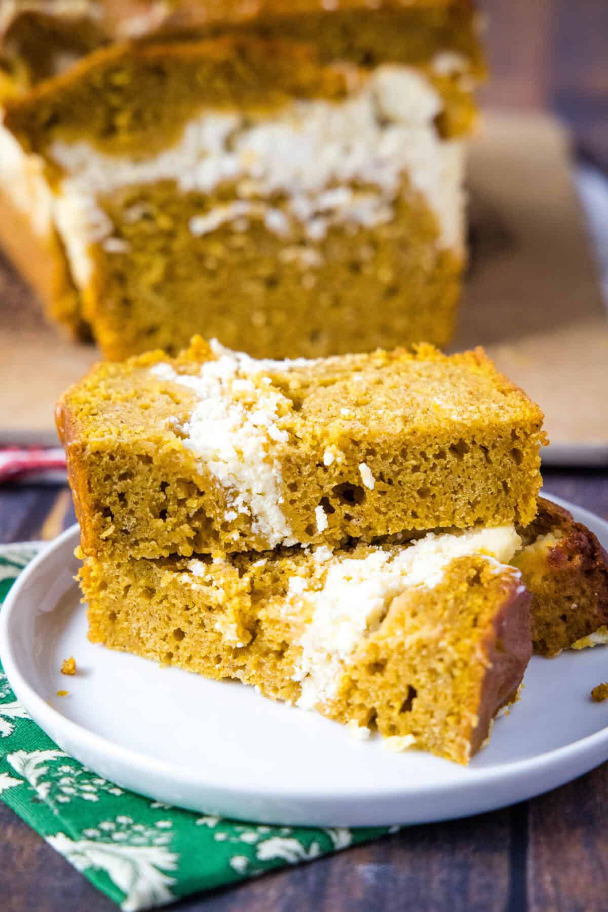 sliced pumpkin cream cheese bread on a plate