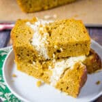 close up pumpkin cream cheese bread sliced on a plate